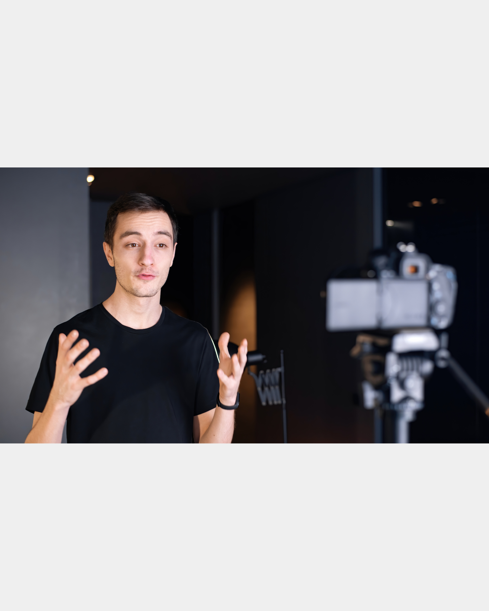 Creator speaking to a camera while filming a video