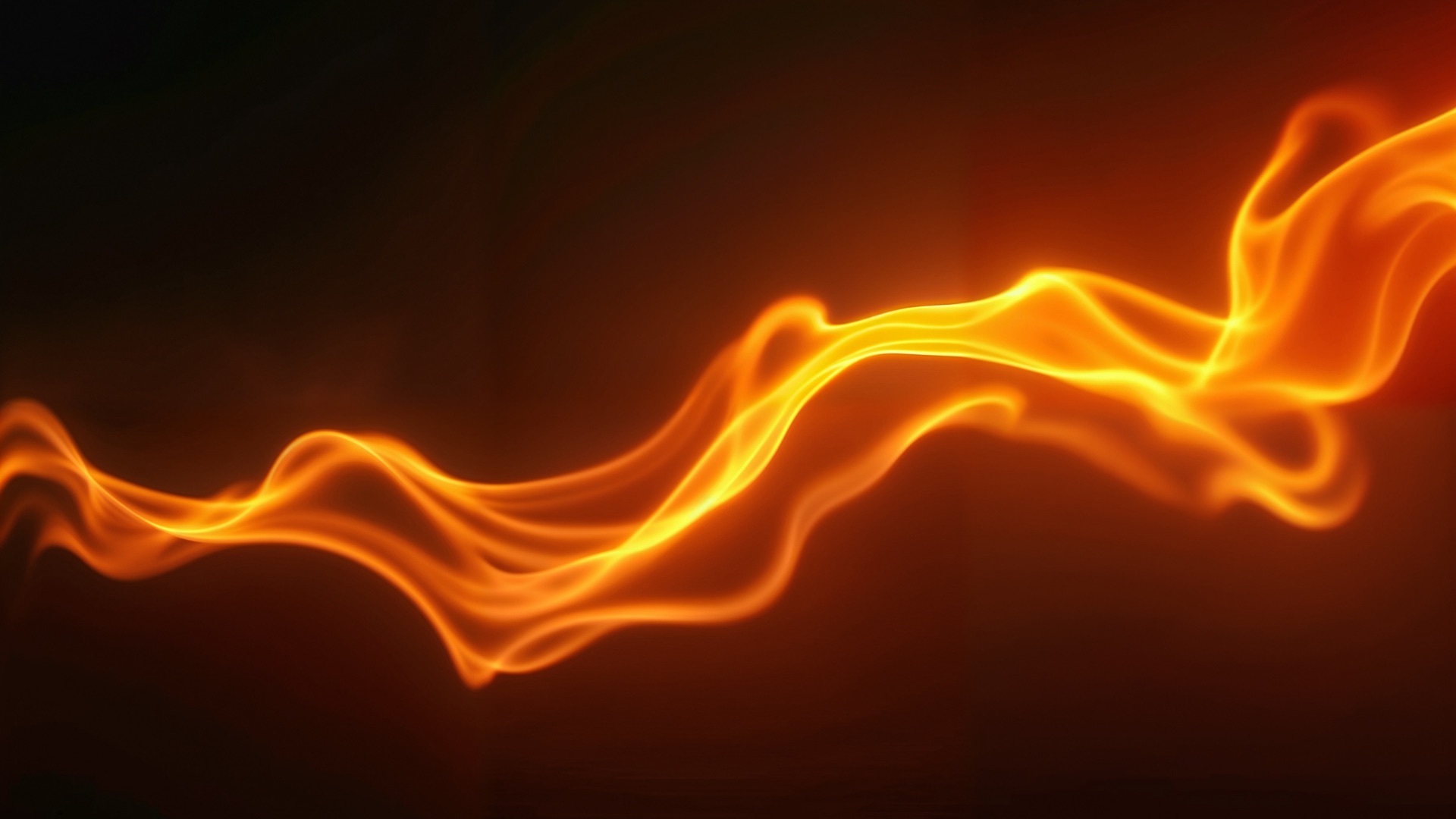 Abstract flowing orange light on a dark background