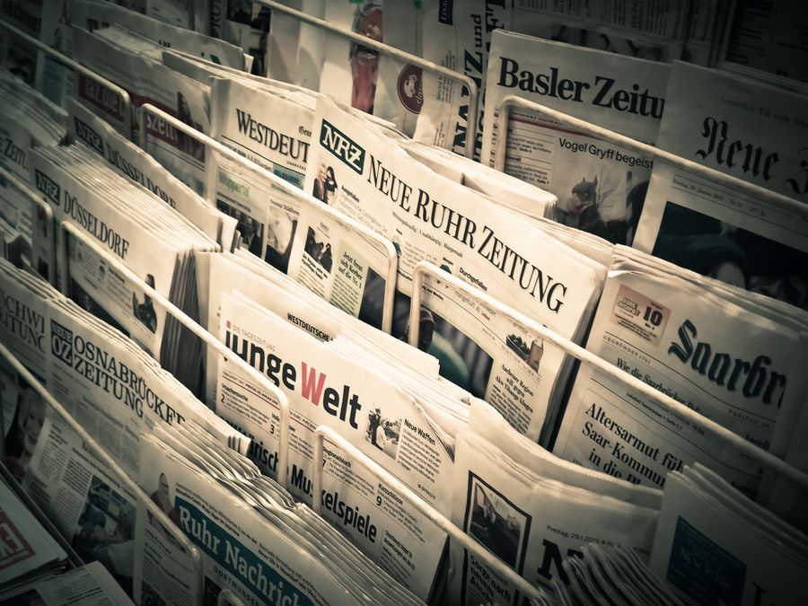 A selection of published newspapers representing newsletter writing
