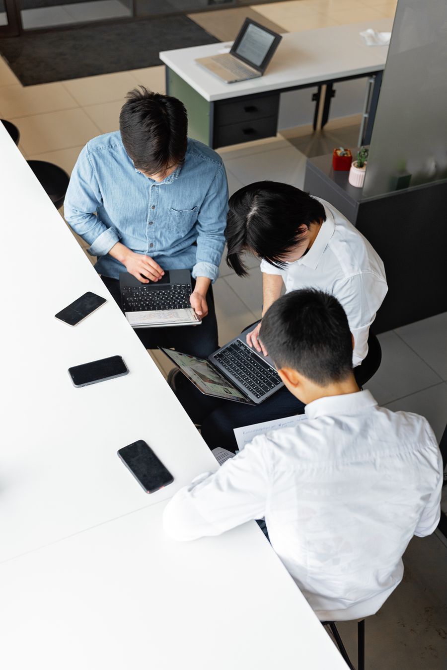 Business coach speaking with a client in an office