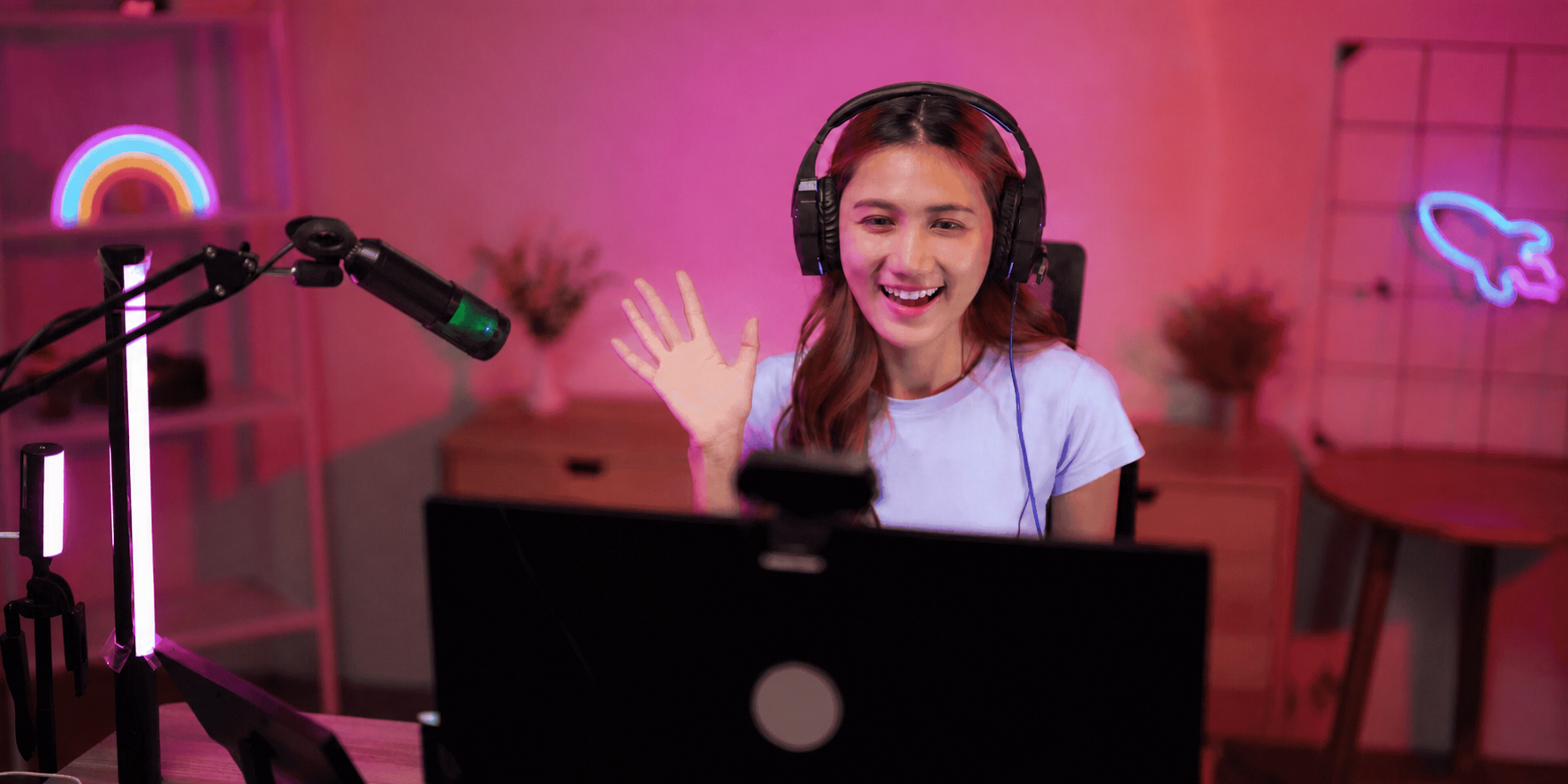 Independent creator livestreaming from a colorful home content studio