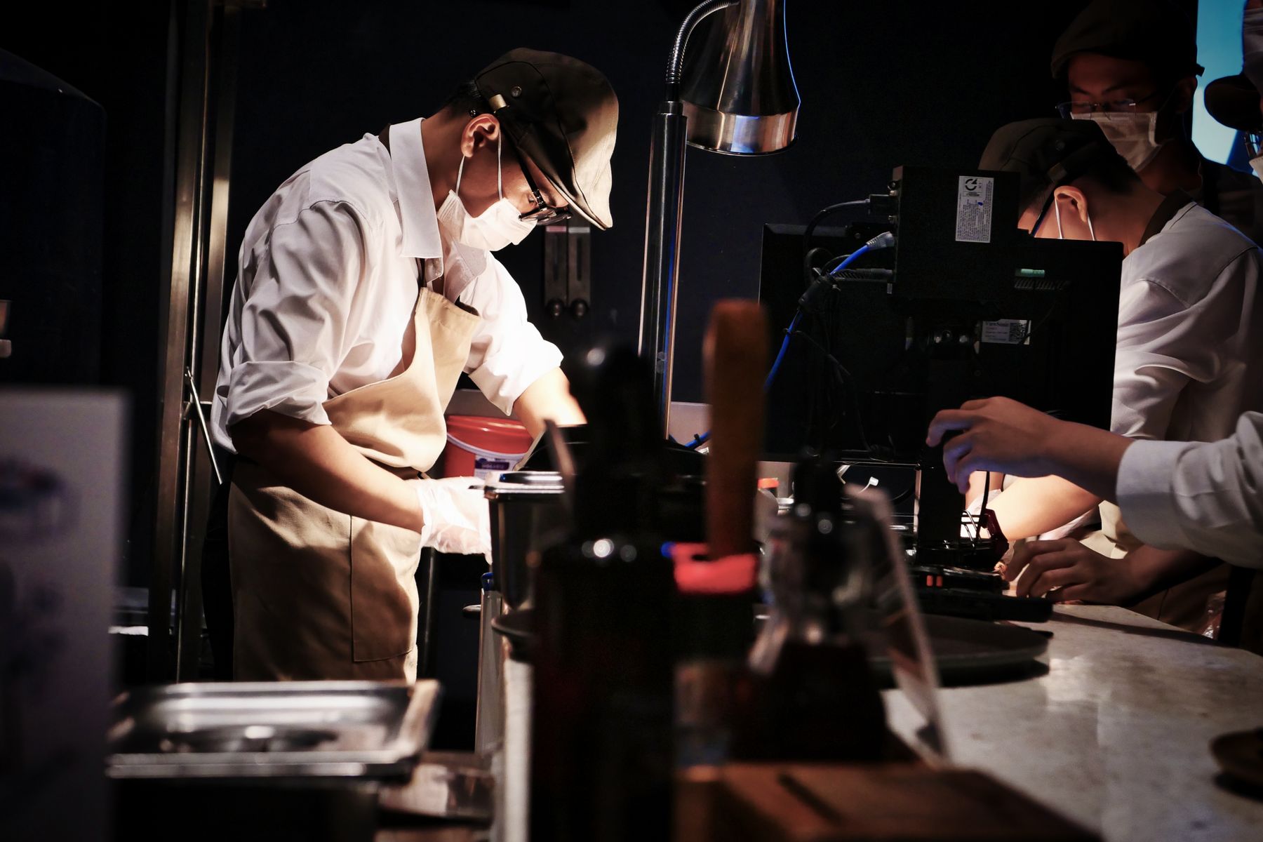 Professional chefs working together in a restaurant kitchen