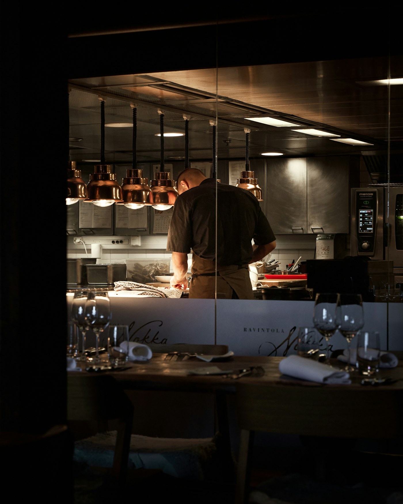 A person cooking in a restaurant