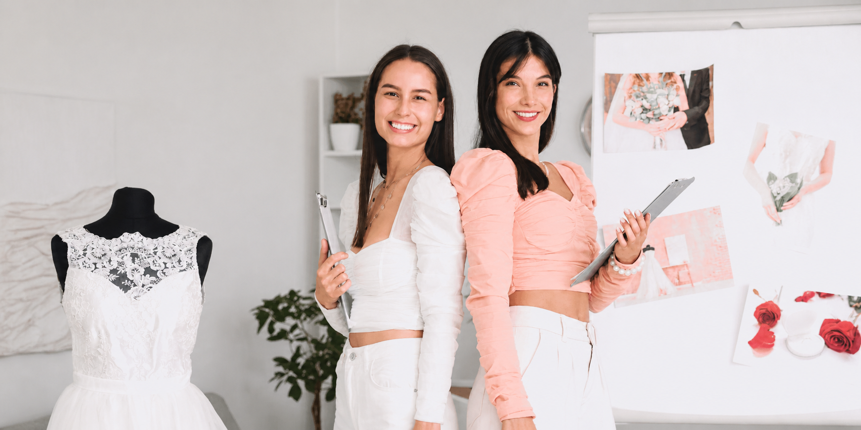 Wedding planners reviewing bridal details beside a gown and inspiration board