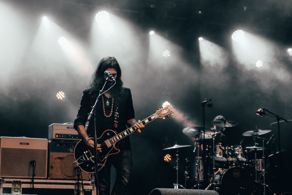 Guitarist performing live on stage