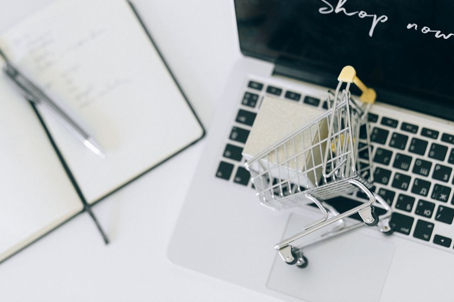 Shopify merchant managing an online store from a laptop