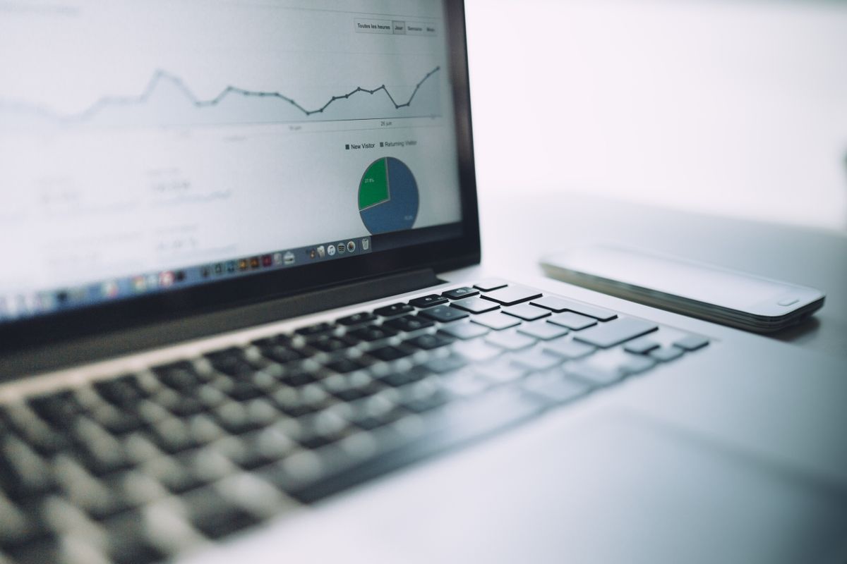 Laptop displaying a software analytics dashboard